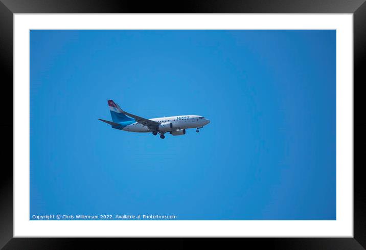 plane form luxair in the blue sky on arrival Framed Mounted Print by Chris Willemsen