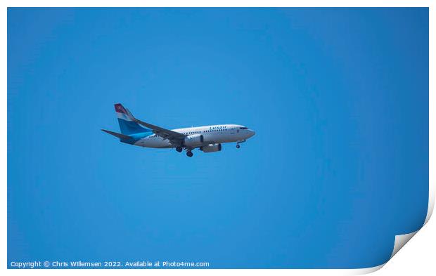 plane form luxair in the blue sky on arrival Print by Chris Willemsen