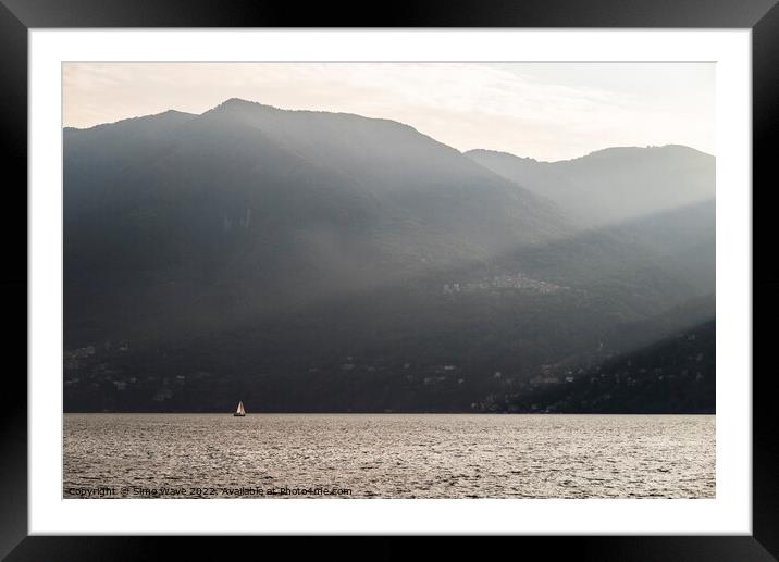 Boat in the middle of Lake Como Italy  Framed Mounted Print by Simo Wave