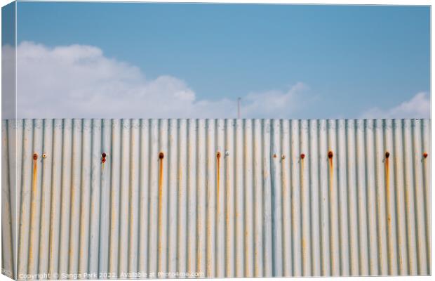 Gray wall and blue sky Canvas Print by Sanga Park