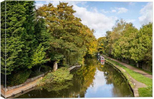 Looking up the Leeds Liverpool canal in autumn Canvas Print by Jason Wells