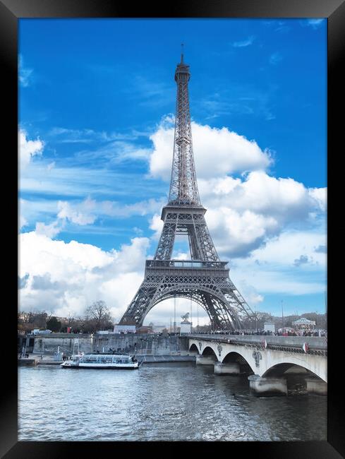 Eiffel Tower located in capital city of Paris, France with Seine Framed Print by Thomas Baker