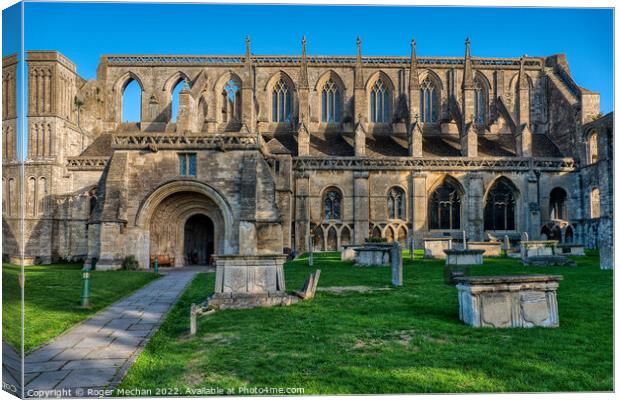 The Ancient Beauty of Malmesbury Abbey Canvas Print by Roger Mechan