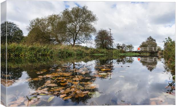 Reflections on the Leeds Liverpool canal Canvas Print by Jason Wells