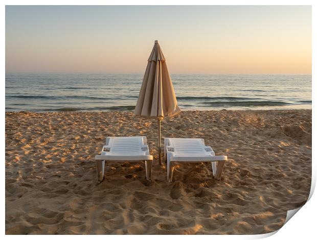 Sun beds on Falesia Beach in Portugal Print by Tony Twyman