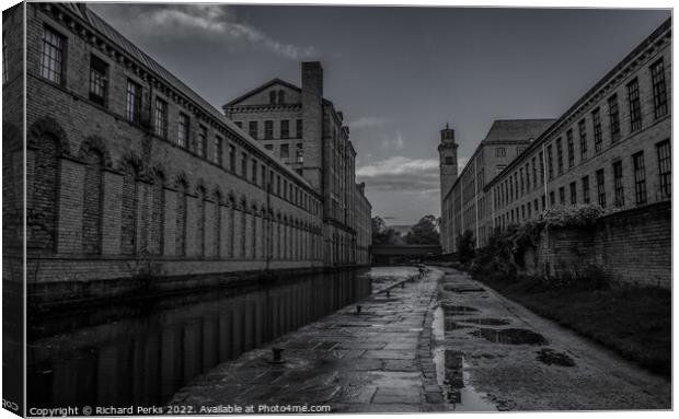 Salts Mill in reflection Canvas Print by Richard Perks