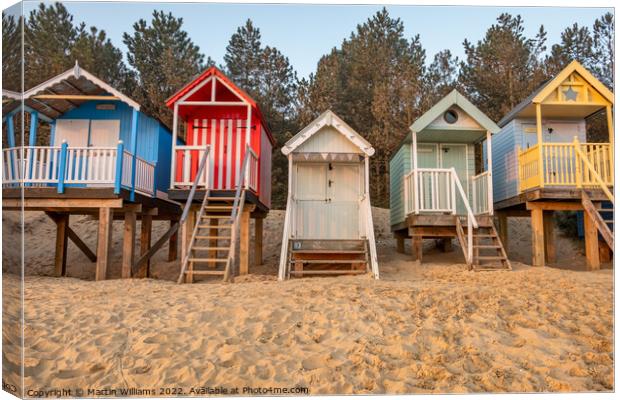 Beach huts at Wells-Next-the-Sea Canvas Print by Martin Williams