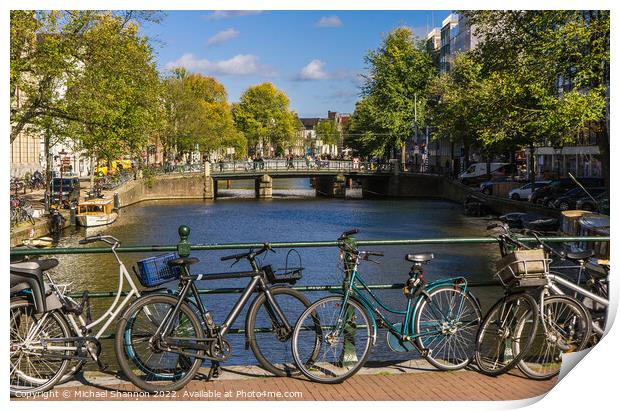 Bridge, canal view and bikes - Amsterdam Print by Michael Shannon