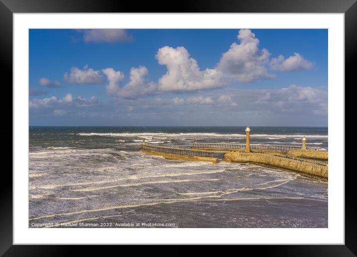 Clifftop view of the piers in Whitby, North Yorksh Framed Mounted Print by Michael Shannon