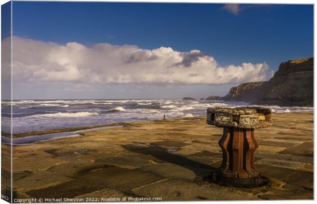Rusty old Capstan on the East Pier, Whitby, North  Canvas Print by Michael Shannon