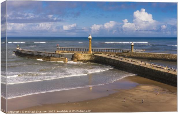 Whitby - West and East Piers and Lighthouses Canvas Print by Michael Shannon
