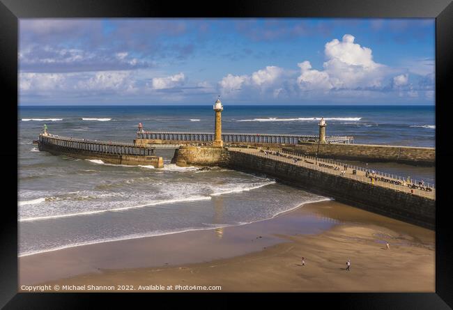 Whitby - West and East Piers and Lighthouses Framed Print by Michael Shannon