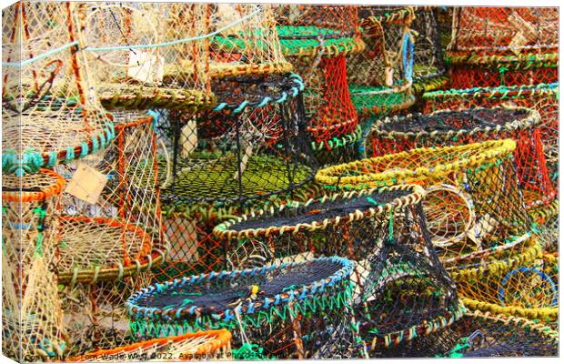 Crab pots stacked in Brixham Harbour Canvas Print by Tom Wade-West