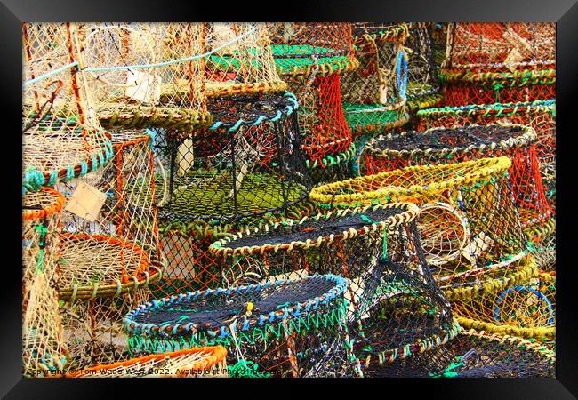 Crab pots stacked in Brixham Harbour Framed Print by Tom Wade-West