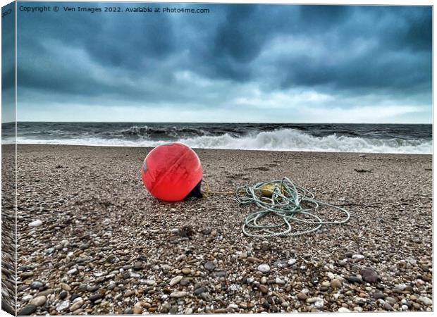 Beach and buoy on A Devon Beach Canvas Print by  Ven Images