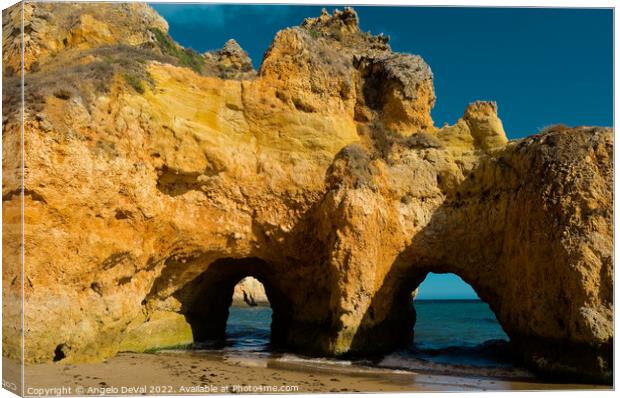 Rocky Arches in Three Brothers beach. Algarve, Portugal Canvas Print by Angelo DeVal