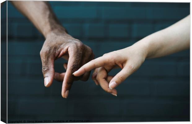 Hands touching together Canvas Print by Simo Wave