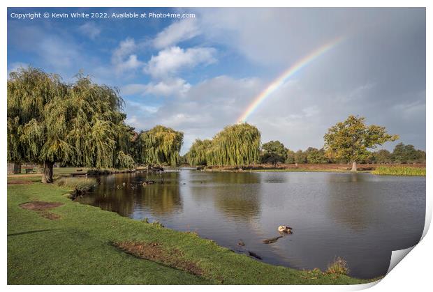 Rainbow over ponds Print by Kevin White