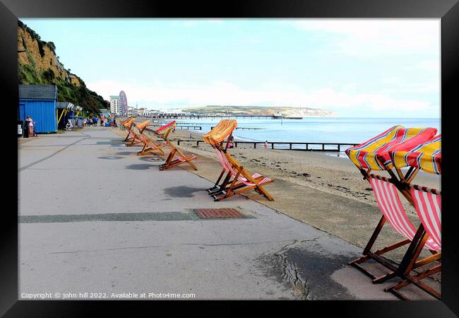 Empty deck chairs, Sandown, Isle of Wight, UK. Framed Print by john hill