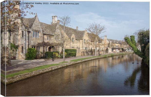 Row of cottages in Bourton-on-the-Water Canvas Print by Christopher Keeley