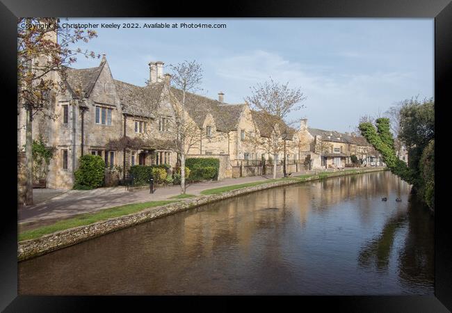 Row of cottages in Bourton-on-the-Water Framed Print by Christopher Keeley