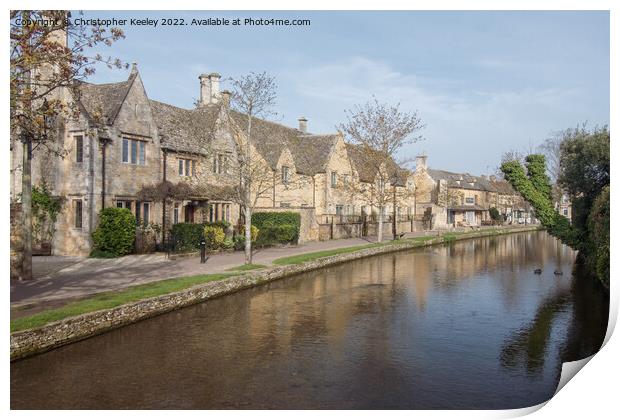 Row of cottages in Bourton-on-the-Water Print by Christopher Keeley