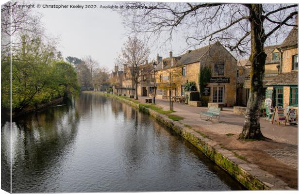 Early morning in Bourton-on-the-Water Canvas Print by Christopher Keeley