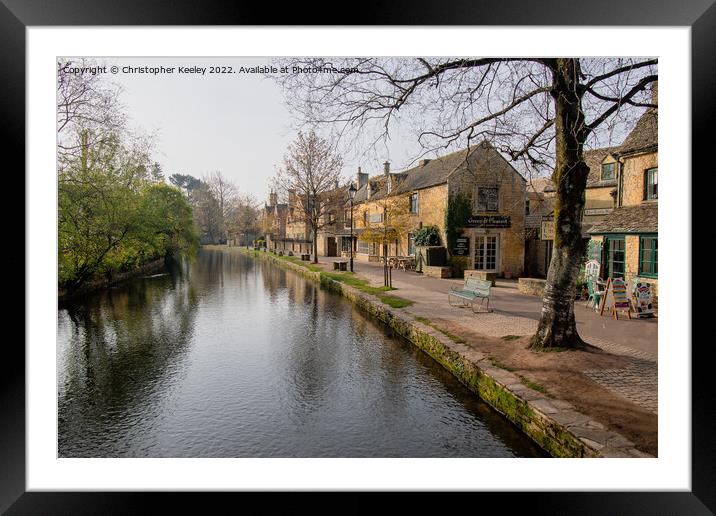 Early morning in Bourton-on-the-Water Framed Mounted Print by Christopher Keeley