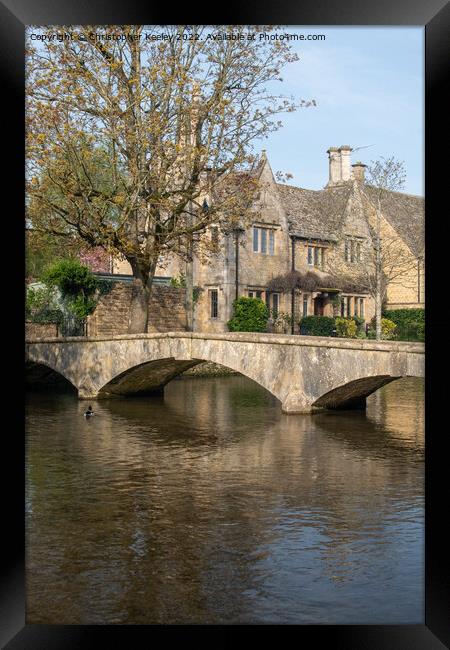 Bridge and cottages in Bourton-on-the-Water Framed Print by Christopher Keeley