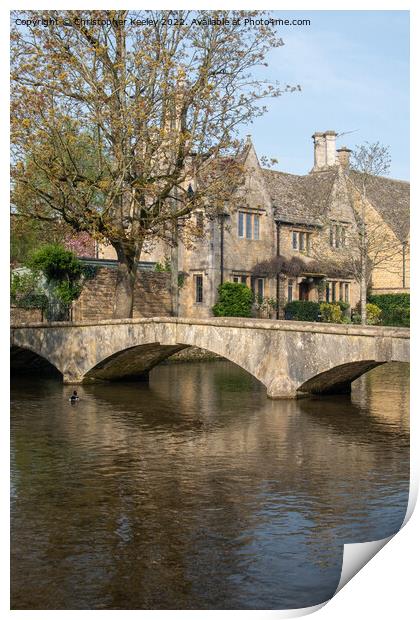 Bridge and cottages in Bourton-on-the-Water Print by Christopher Keeley