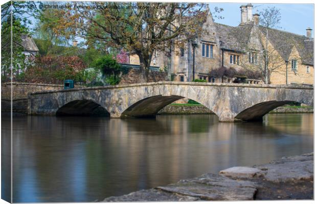 Stone bridge in Cotswolds Bourton-on-the-Water Canvas Print by Christopher Keeley