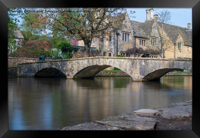 Stone bridge in Cotswolds Bourton-on-the-Water Framed Print by Christopher Keeley