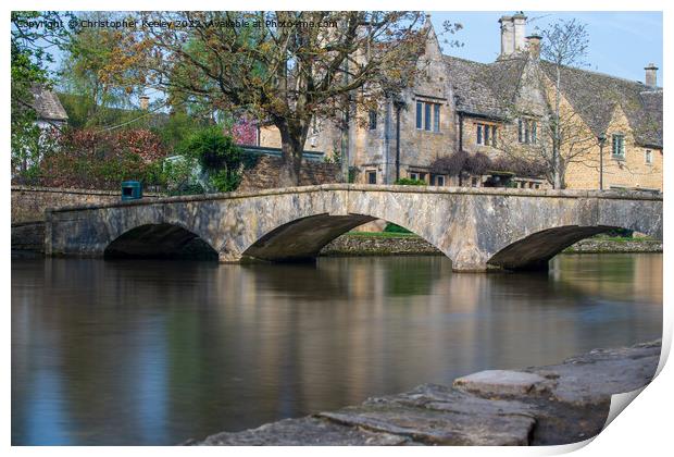 Stone bridge in Cotswolds Bourton-on-the-Water Print by Christopher Keeley