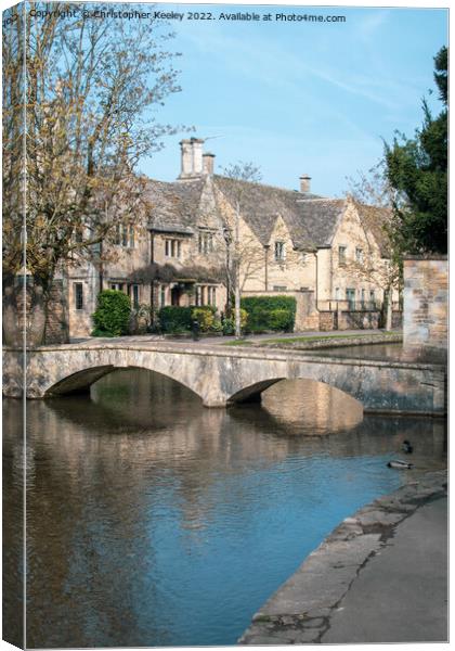 Bourton-on-the-Water in the Cotswolds Canvas Print by Christopher Keeley