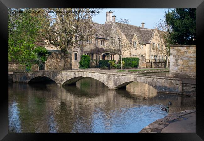 Bourton-on-the-Water bridge Framed Print by Christopher Keeley