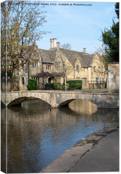 Bourton-on-the Water arched bridge, Cotswolds Canvas Print by Christopher Keeley