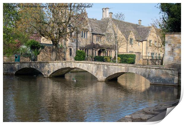 Stone bridge in Bourton-on-the-Water, Cotswolds Print by Christopher Keeley
