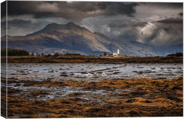 Ornsay Lighthouse as seen from Skye Canvas Print by John Frid