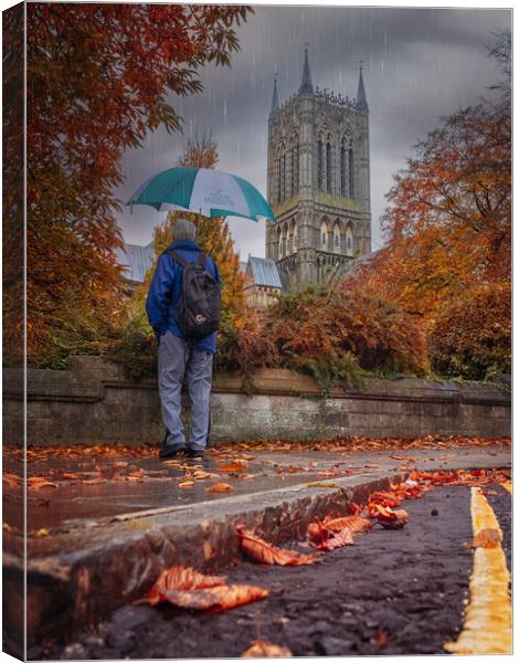 The umbrella man - Lincoln Cathedral Canvas Print by Andrew Scott