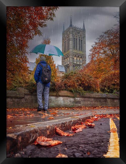 The umbrella man - Lincoln Cathedral Framed Print by Andrew Scott