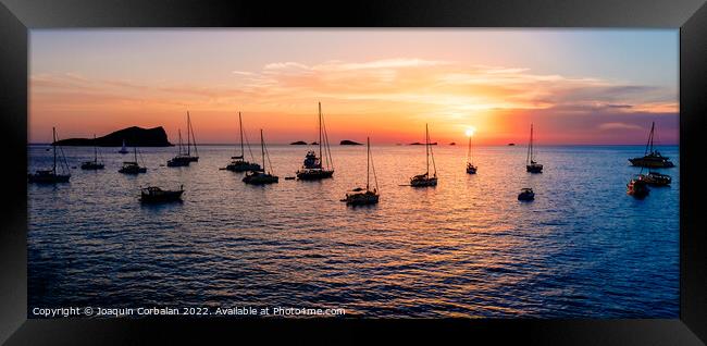 Several yachts and boats anchored near the coast relax watching  Framed Print by Joaquin Corbalan