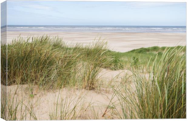 Ainsdale beach over the sand dunes Canvas Print by Jason Wells