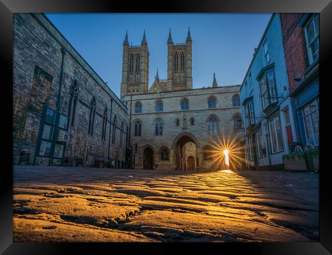 Sun lights up the cobbles - Lincoln Cathedral Framed Print by Andrew Scott