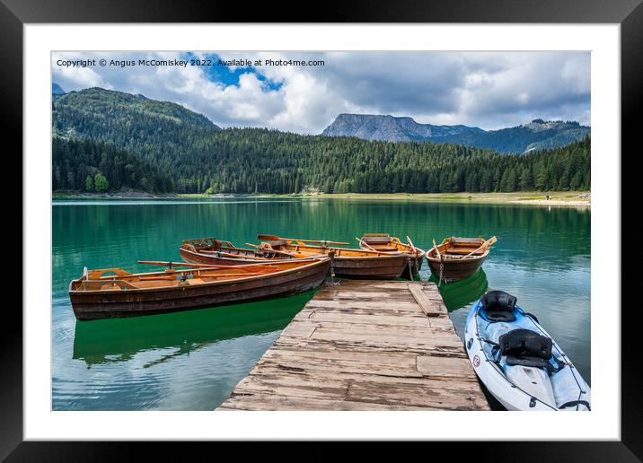Rowing boats on the Black Lake in Montenegro Framed Mounted Print by Angus McComiskey