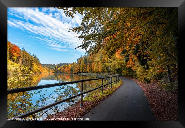Road along the Vltava river in the autumn season. Framed Print by Sergey Fedoskin