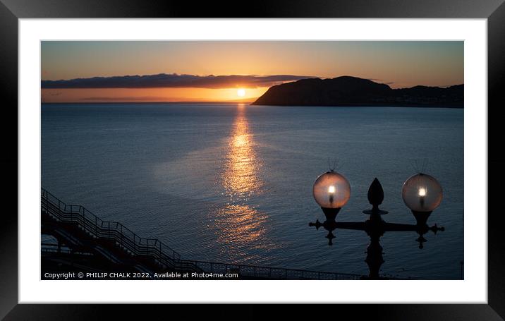 Sunrise from Llandudno pier in north Wales 825  Framed Mounted Print by PHILIP CHALK