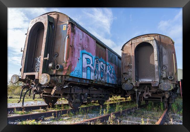 Rusting Abandoned Railway Carriages with Graffiti Framed Print by Heather Sheldrick