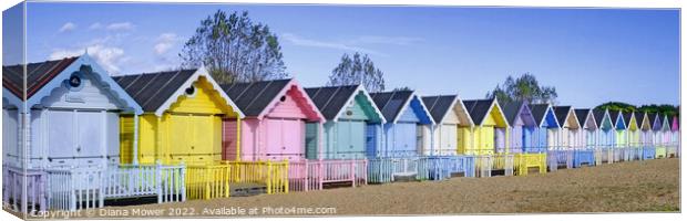 West Mersea Beach Huts Panoramic Canvas Print by Diana Mower