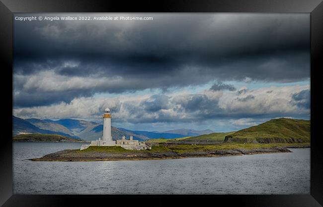 Lismore Lighthouse and mountain view Framed Print by Angela Wallace