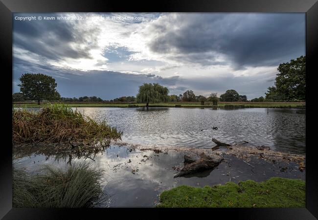 Dramatic stormy sky at Bushy Park Framed Print by Kevin White